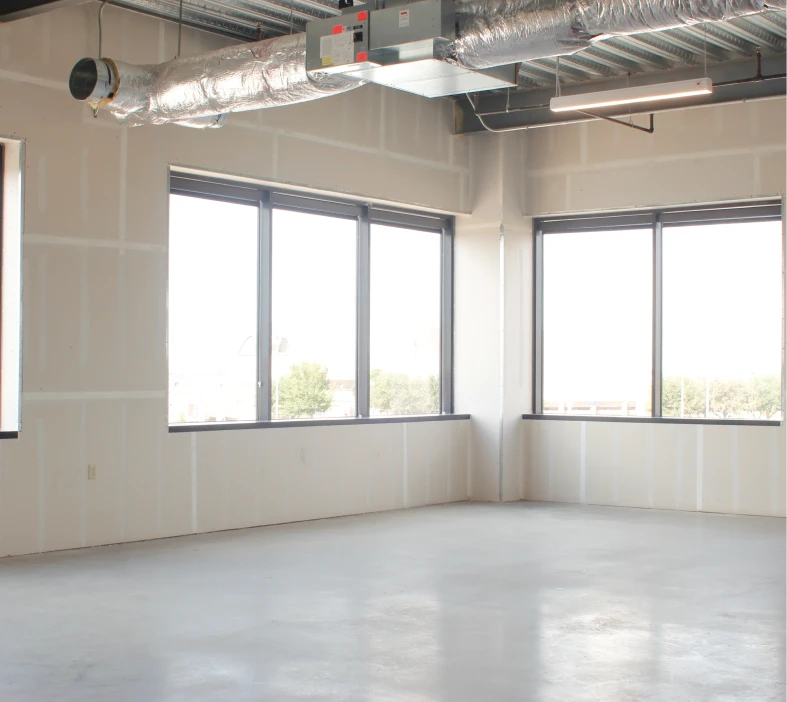 Industrial-style room with exposed ductwork